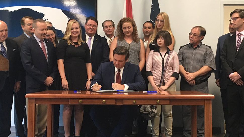 Gov. Ron DeSantis at Kennedy Space Center on Monday, June 24, 2019, signing a bill to increase apprenticeship opportunities along the Space Coast. (Jerry Hume/Spectrum News 13)