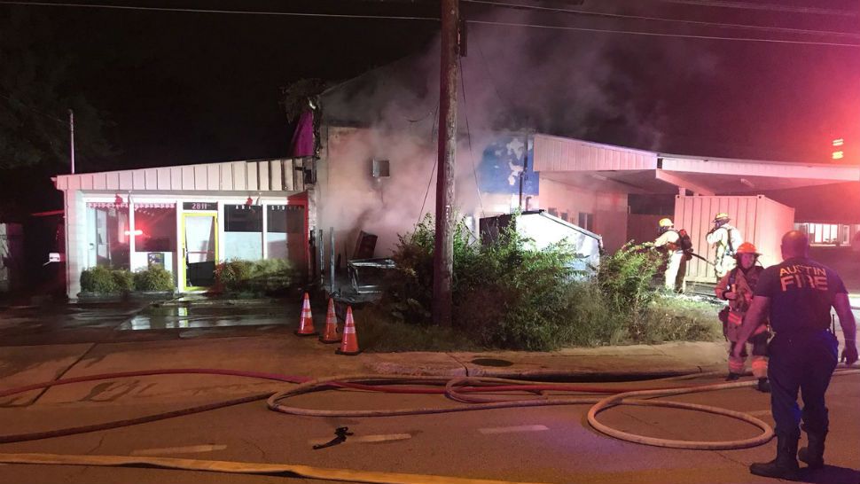 Fire spreads to 3 buildings, causing $25K in damage