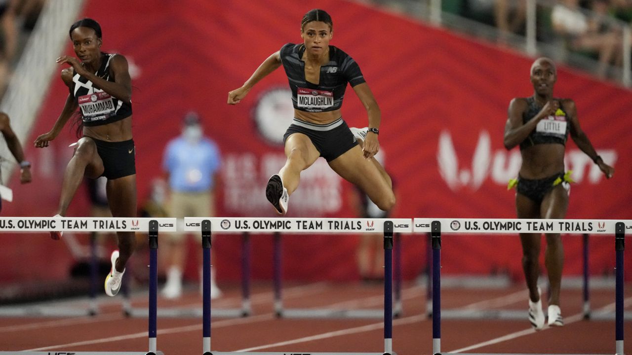 Sydney McLaughlin sets a new world record in the finals of the women's 400-meter hurdles at the U.S. Olympic Track and Field Trials Sunday, June 27, 2021, in Eugene, Ore.(AP Photo/Ashley Landis)