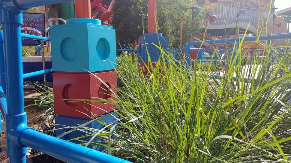 The grass in Toy Story Land is tall to give the illusion that you've "shrunk" to the size of a toy. The new land at Disney's Hollywood Studios features 2 new attractions and opens to the public on Saturday, June 30, 2018. (Ashley Carter, staff)