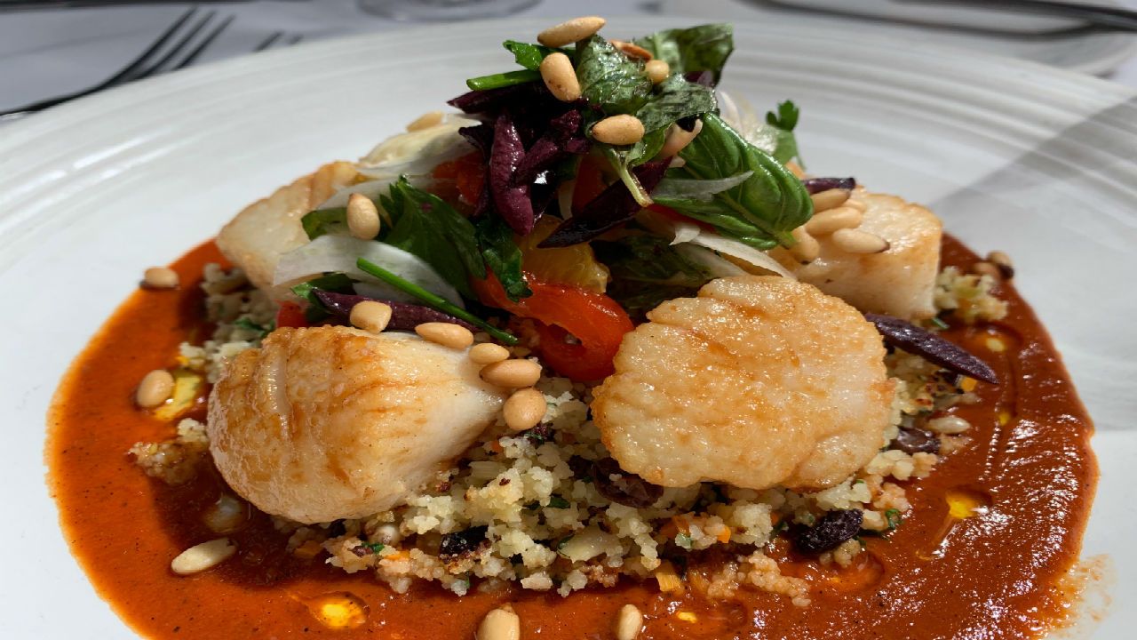 A Chapel Hill chef is celebrating 20 years in business with his worldly twist to high-end cuisine. 