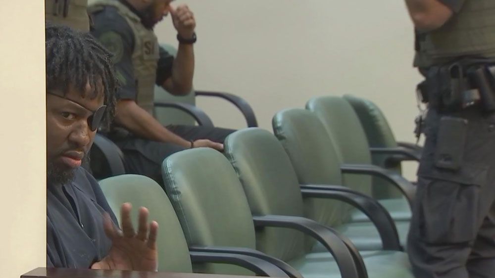 Markeith Loyd waves to the camera during a court appearance Friday, June 29. Loyd is on trial for the deaths of Sade Dixon, her unborn child, and Orlando Police Lt. Deborah Clayton. (Spectrum News 13)