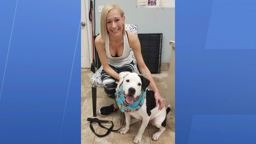 Dots, 3, poses with his new human, Liz Shidler of Orlando. Dots had set a record for the longest stint at the SPCA of Brevard. (Courtesy of SPCA of Brevard)