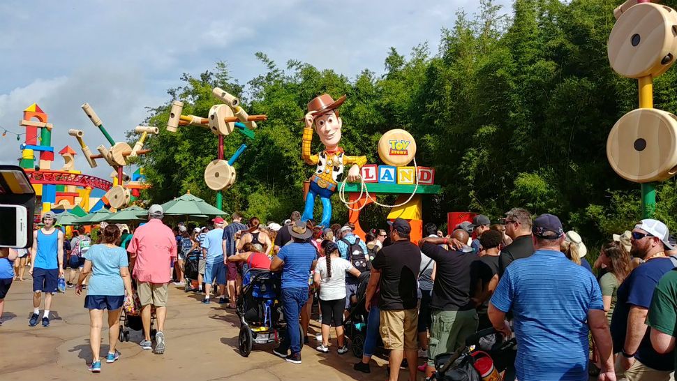 People waiting to ride Slinky Dog Dash, one of the new rides at Toy Story Land. The new land opened Saturday at Disney's Hollywood Studios. (Ashley Carter, staff)