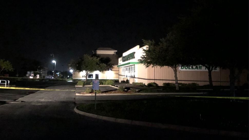 The Dollar Tree on County Line Road remains taped off. (Tim Wonka/Spectrum Bay News 9)