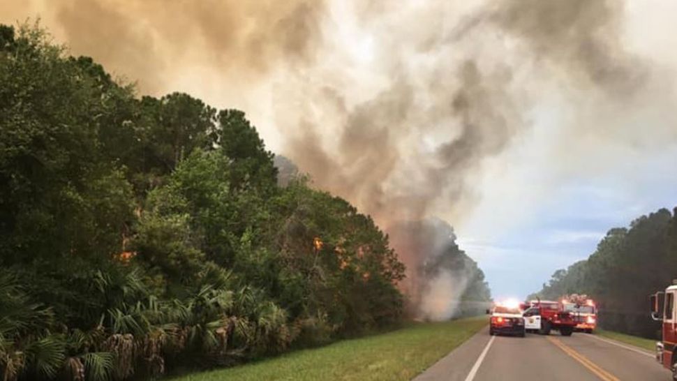  Crews in Brevard County are battling a growing brush fire in Titusville. (Courtesy of Brevard County Fire Rescue)