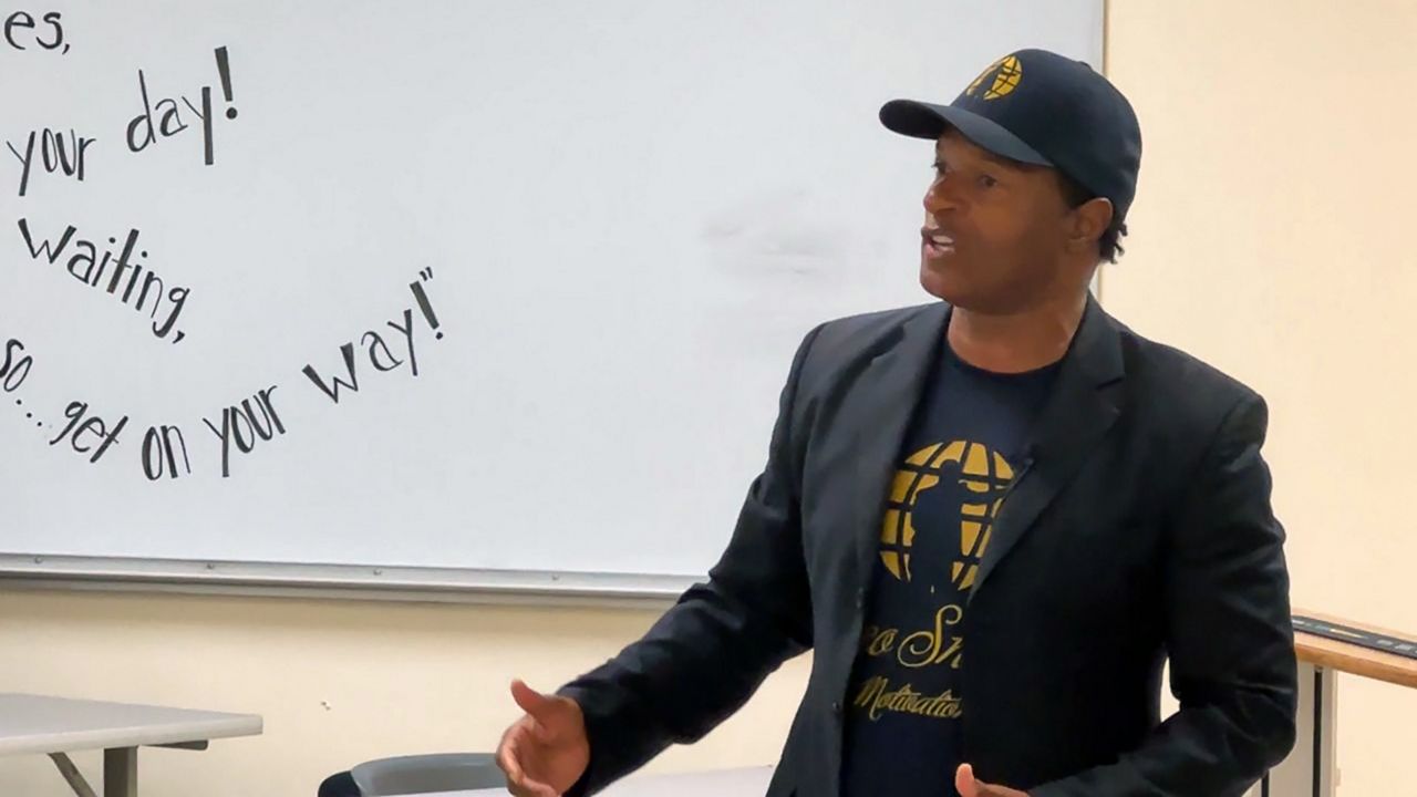 Rico Sharp, a local pastor and motivational speaker, talks with students about mental health issues caused by the COVID-19 pandemic at Florida Technical College in DeLand. (Spectrum News 13/Jeff Allen) 