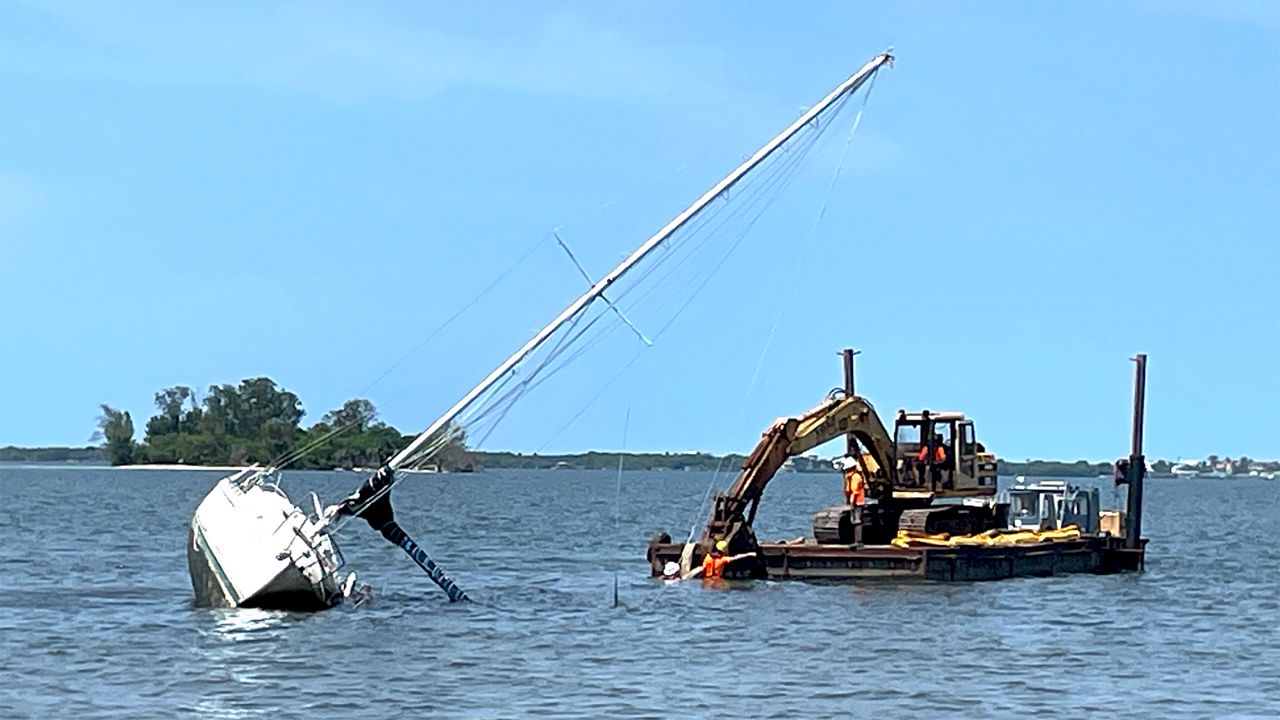 50 derelict boats being removed from the Indian River Lagoon