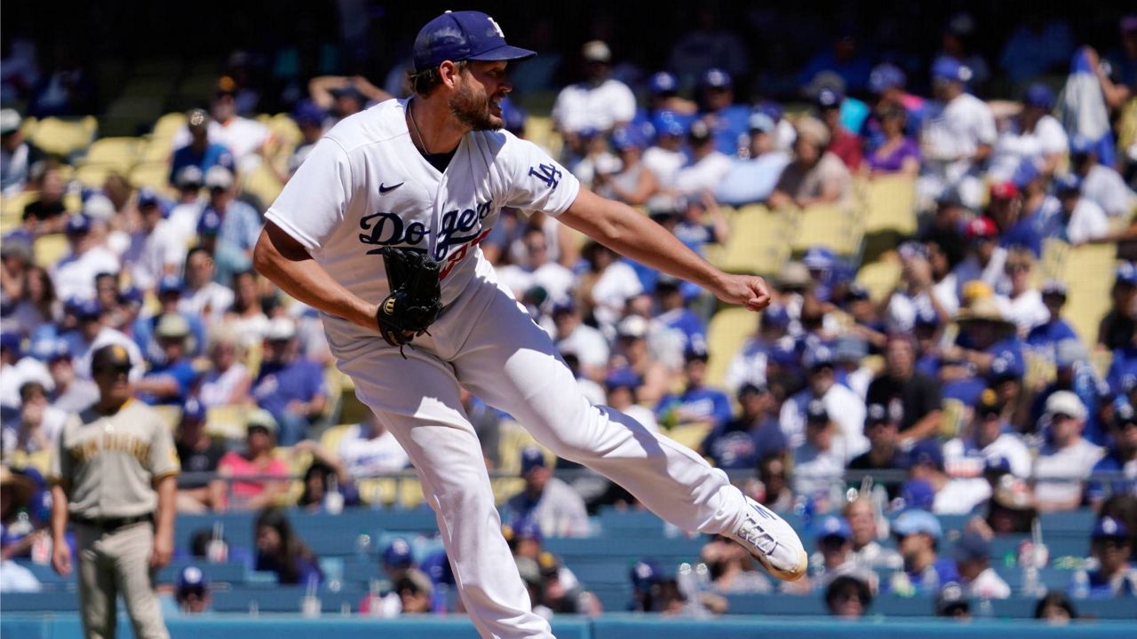 Los Angeles Dodgers starting pitcher Clayton Kershaw throws to the plate during the seventh inning of a baseball game against the San Diego Padres Sunday in LA. (AP Photo/Mark J. Terrill)