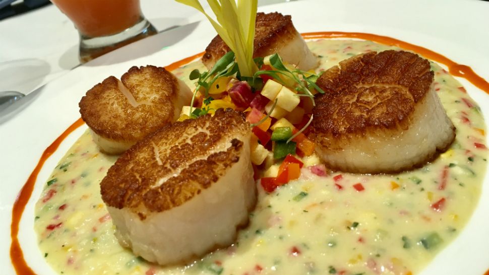 Scallops replace shrimp for this seafood 'n' grits entree with a special peppadew sauce. 
