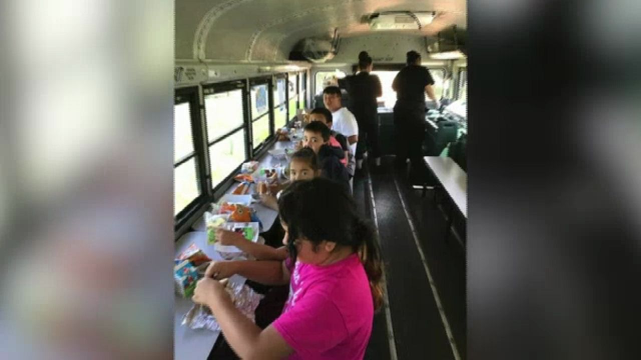 Kids Eating Yum Yum Bus