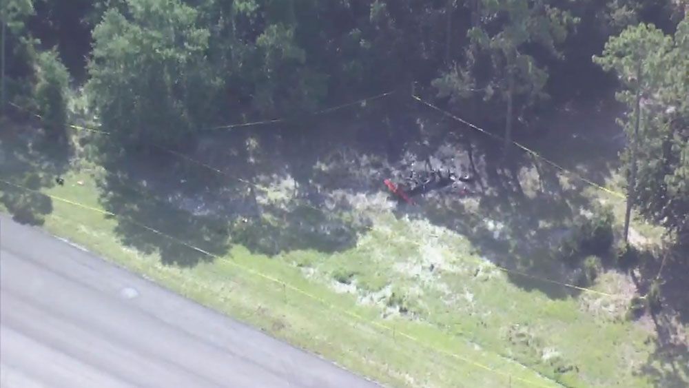 What's left of the wreckage of a small plane that crashed near Spruce Creek Fly-In in Port Orange. (Sky 13)