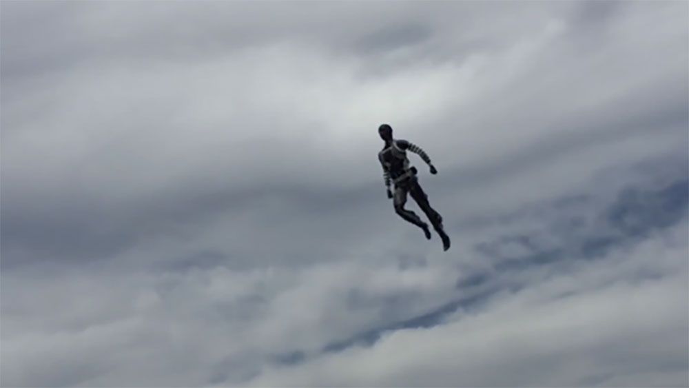This black figure doing a superhero pose 60 feet in the air is an example of Disney's new 'Stuntronics.' (Disney)