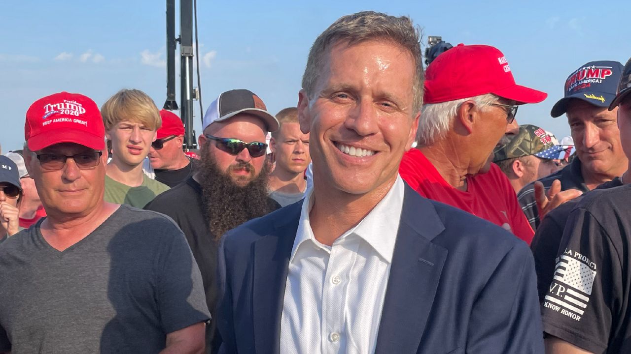 Former Missouri Gov. Eric Greitens, a leading Republican contender for the state's U.S. Senate primary, attended a rally by former President Donald Trump last month near Quincy, Ill.