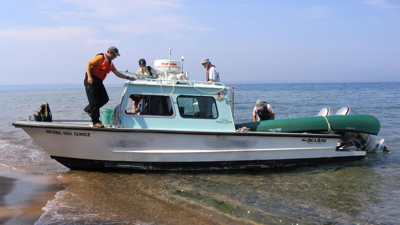 Researchers get ready to pull up sediment samples from Outer Lagoon in the Apostle Islands