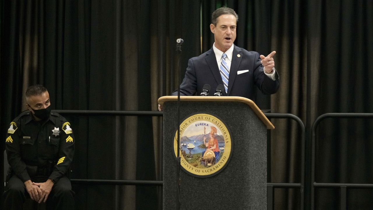 Orange County District Attorney Todd Spitzer makes a statement prior to the sentencing of Joseph James DeAngelo in Sacramento Superior Court held at CSU Sacramento in Sacramento, Calif., Friday, Aug. 21, 2020. (AP Photo/Randall Benton)