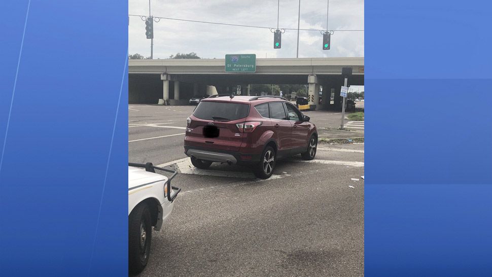 A man and woman are facing child neglect charges after they were found passed out in an SUV with children inside, according to the Hillsborough County Sheriff's Office. (Hillsborough County Sheriff's Office)