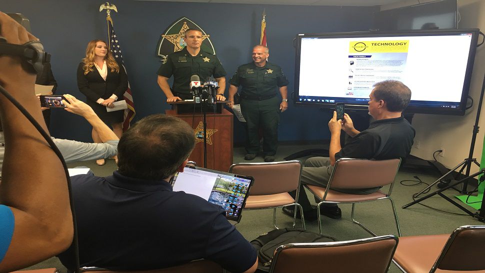 Trafficking Free Zone Florida Regional Manager Stephanie Costolo, Pasco Sheriff Chris Nocco and Cpl. Alan Wilkett explain the details of the county's TFZ program at the Sheriff's Office. (Spectrum News)