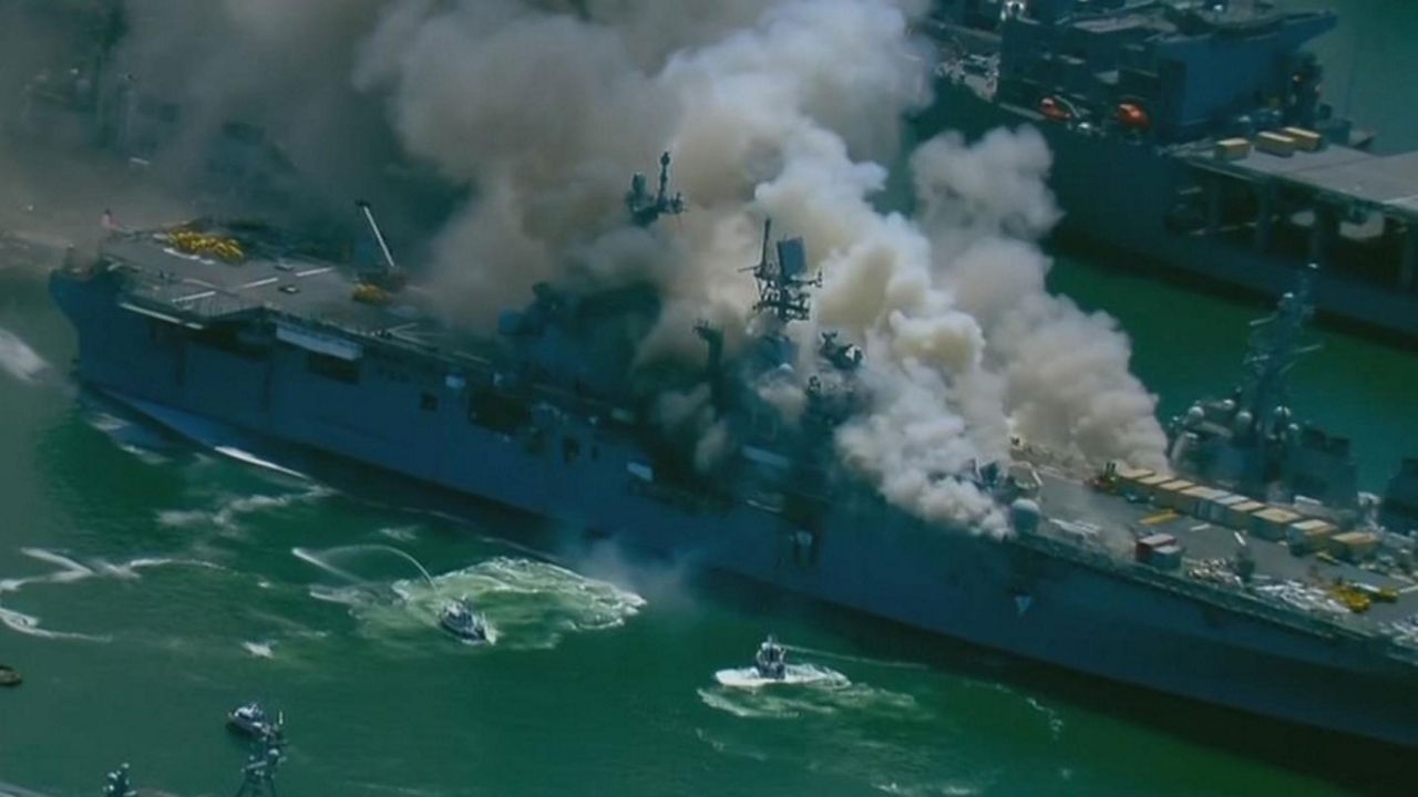 Smoke visible on the deck of the U.S.S. Bonhomme Richard docked at the U.S. Naval Base in San Diego, Sunday, July 12, 2020. (Courtesy: CNN)