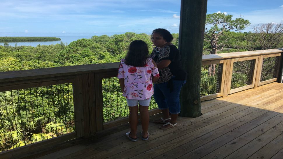 Many park-goers had missed the tower. It's the main attraction for Yadira Calderon and her daughter Thomais. (Jorja Roman, staff).