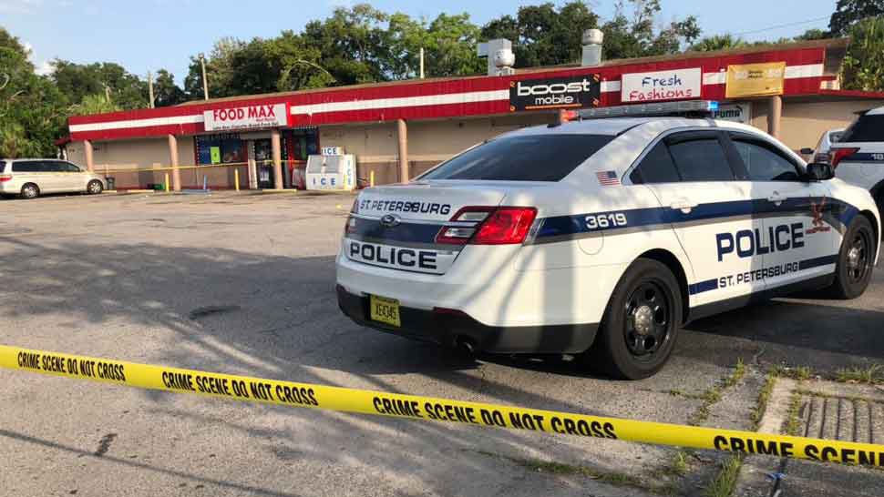 A St. Petersburg Police cruiser in a parking lot where a shooting occurred on Sunday, July 14, 2019. (Trevor Pettiford/Spectrum Bay News 9)