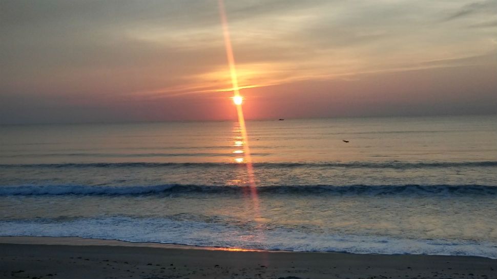 Submitted via the Spectrum News 13 app: Sunrise in Satellite Beach, Saturday, July 14, 2018. (Mark Smith, viewer)
