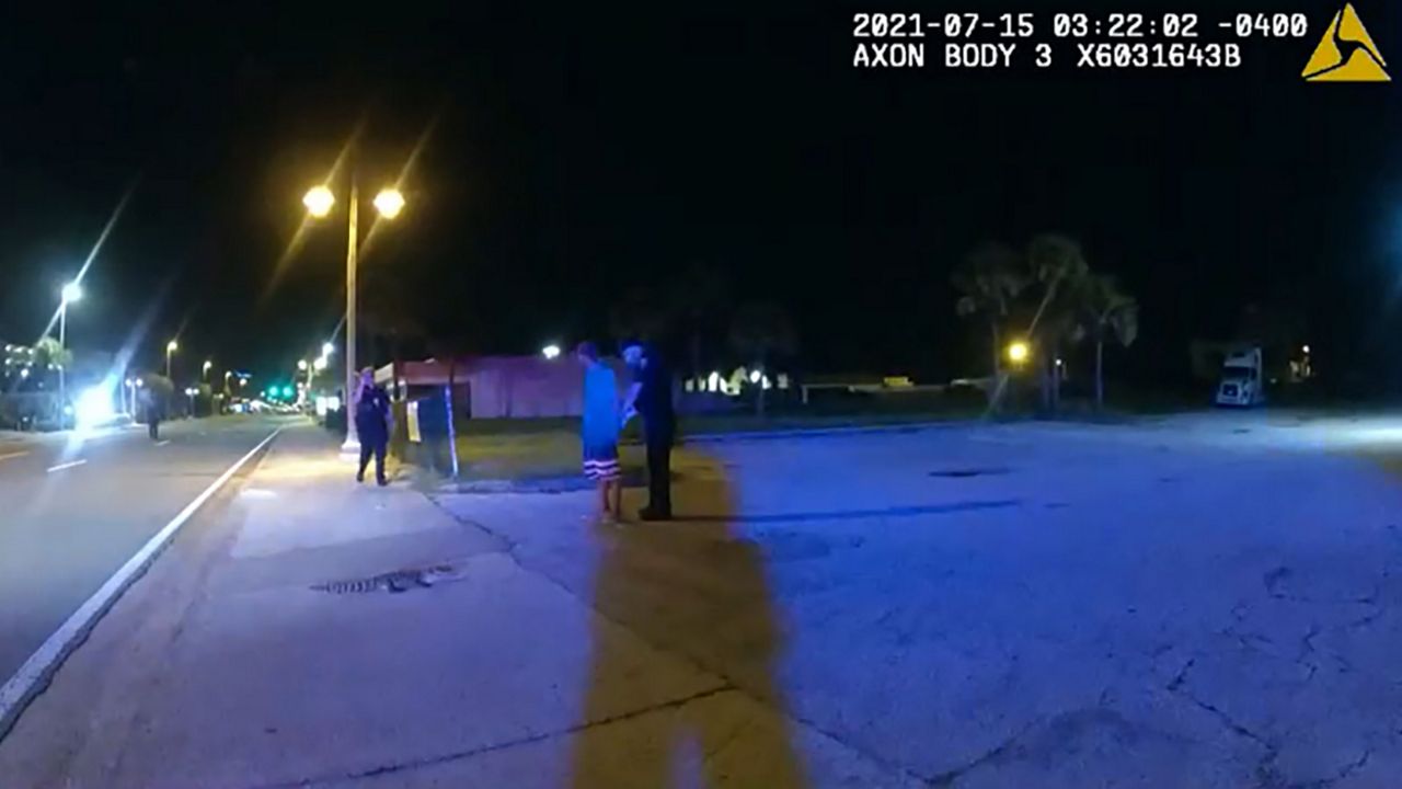 Daytona Beach Shores police body cam video shows William Hodge being arrested on Thursday. Nearby on the ground is a small alligator. (Daytona Beach Shores Police)