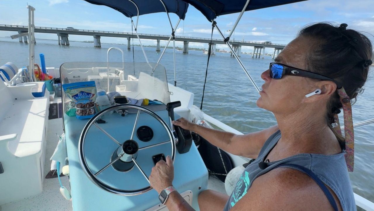 Kathe Fannon has been a charter captain for more than 20 years for “Captain Kathe and First Mate Pup-Pup Charters.” (Spectrum Bay News 9/Julia Hazel)