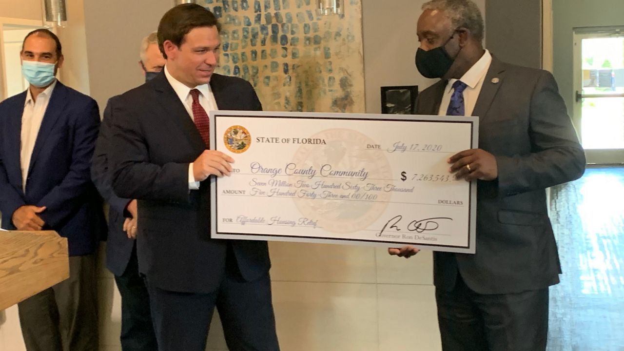 Governor Ron DeSantis announced $7.5 million in CARE Act funds at a news conference in Apopka with Orange County Mayor jerry Demings (Asher Wildman/Spectrum News)