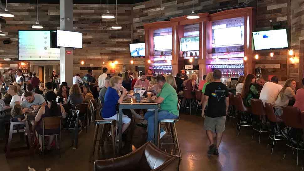Sizable crowd at Funky Buddha Brewery in Oakland Park near Fort Lauderdale, where a major water main break forced the closing of many city businesses and restaurants Thursday, July 18, 2019. (Greg Pallone/Spectrum News)