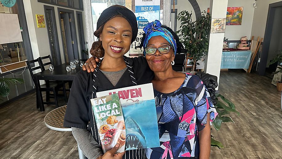 Mika Altidor (left) with her mom inside their business, Vegan Monarch Bakery and Cafe (Spectrum Bay News 9/Lizbeth Gutierrez)