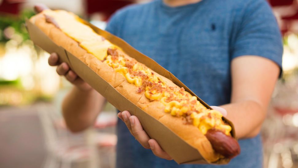 Casey's Corner at the Magic Kingdom is serving up a 2-foot-long hot dog for National Hot Dog Day. (Disney)