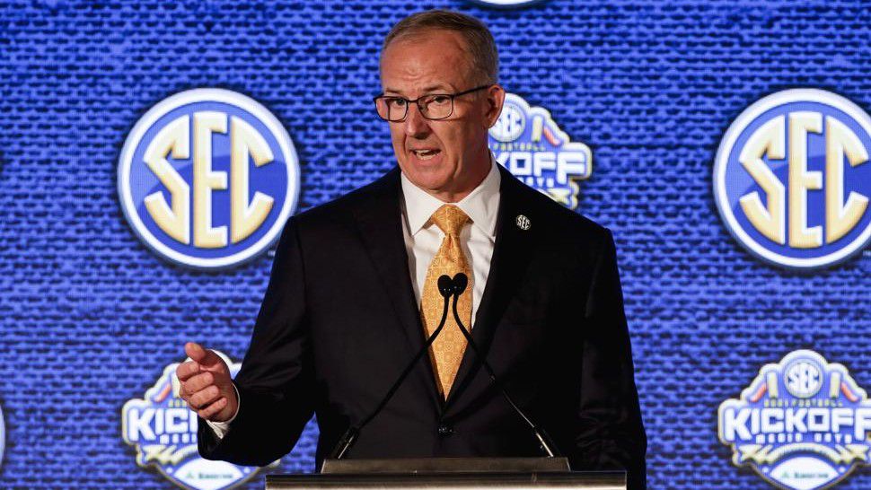 SEC Commissioner Greg Sankey speaks to reporters during the NCAA college football Southeastern Conference Media Days Monday, July 19, 2021, in Hoover, Ala. (AP Photo/Butch Dill)