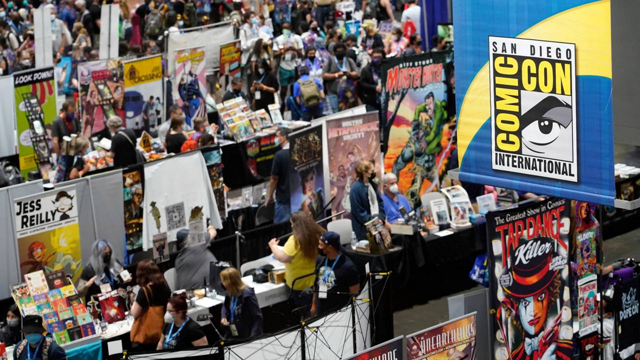 Comic-Con attendees peruse the aisles of the convention show floor during Preview Night at the 2022 Comic-Con International at the San Diego Convention Center on Wednesday. (AP Photo/Chris Pizzello)