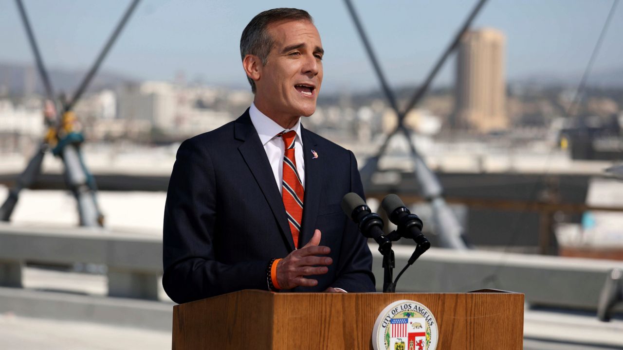 Los Angeles Mayor Eric Garcetti delivers the State of the City Address from the under-construction Sixth Street Viaduct on April 14, 2022, in Los Angeles. (Gary Coronado/Los Angeles Times via AP, Pool)