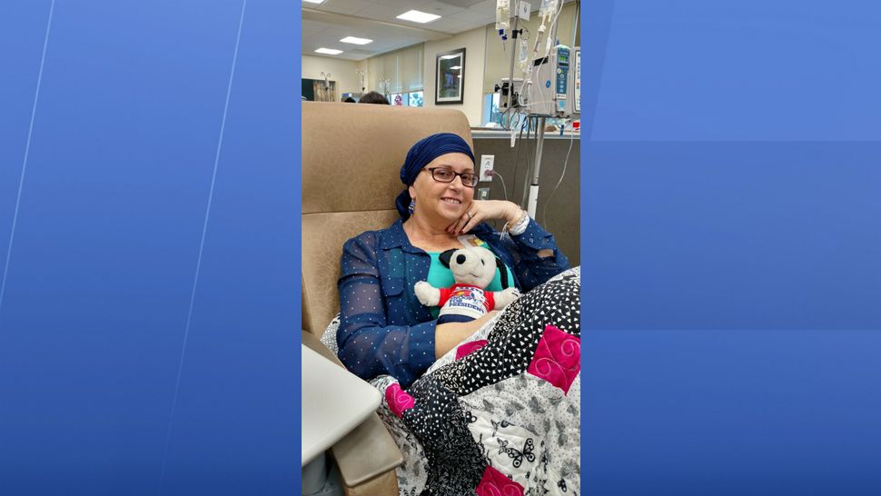 Breast cancer survivor Anne Coletti found her purpose in helping new cancer patients as they begin treatment by creating 'Survivor Sacks.' (Melissa Eichman, staff)