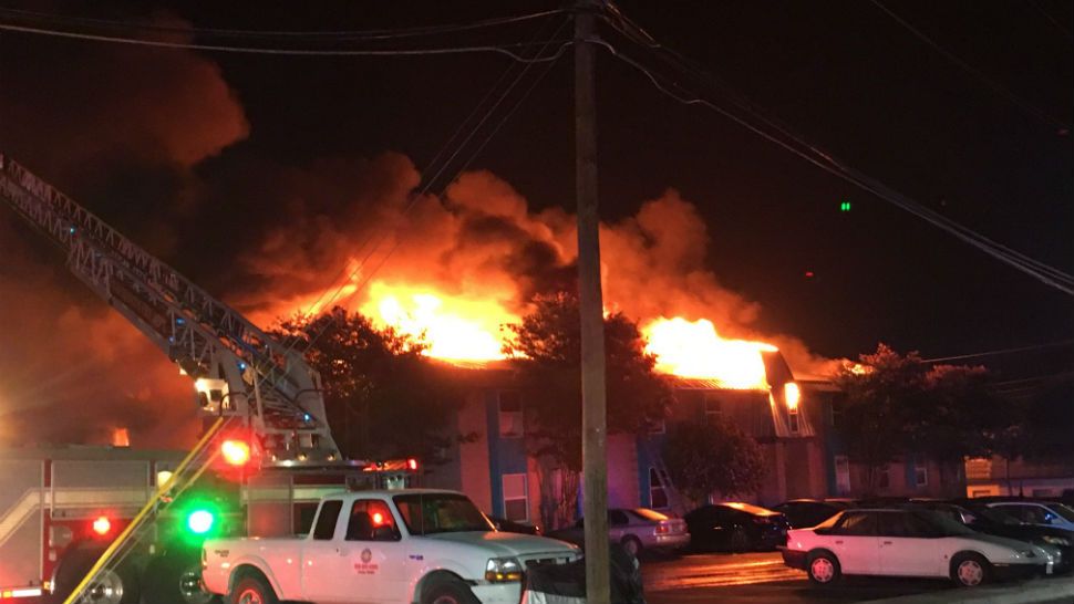 The Iconic Village apartments and Vintage Pad apartments burn in this image from July 20, 2018. (Spectrum News/File)