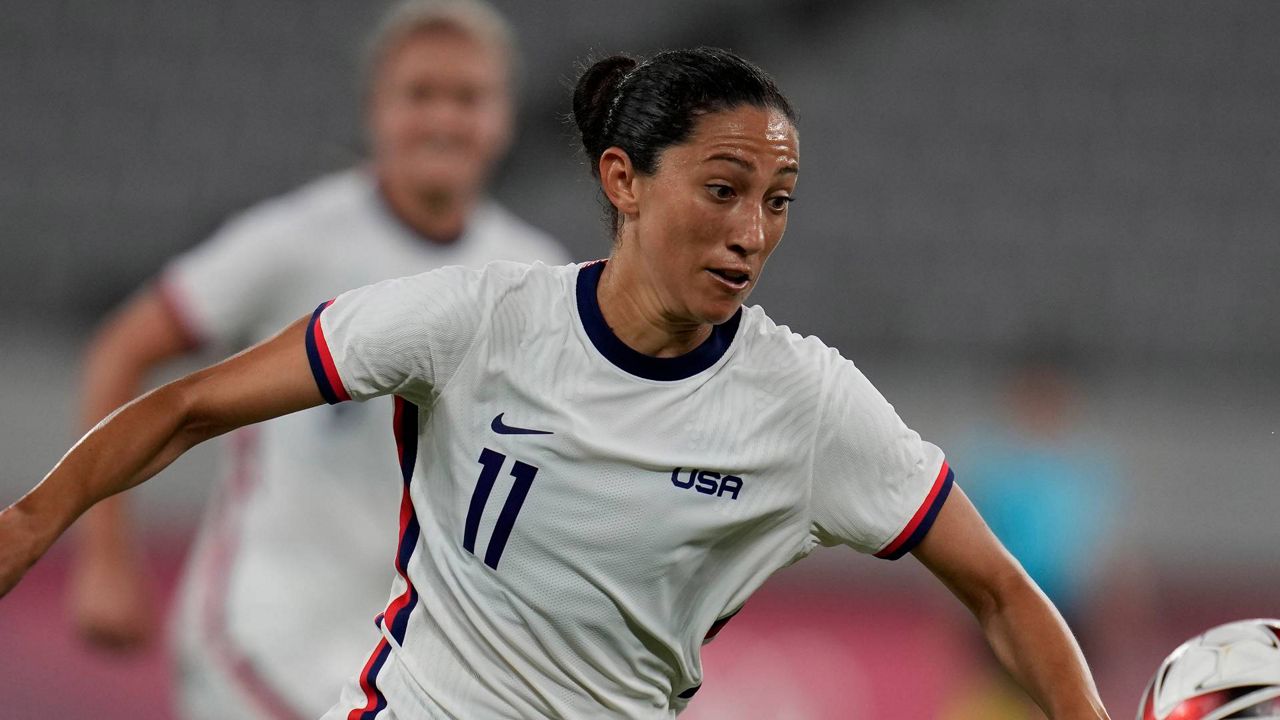 United States' Christen Press controls the ball during a women's soccer match against Sweden at the 2020 Summer Olympics, July 21, 2021, in Tokyo. (AP Photo/Ricardo Mazalan)