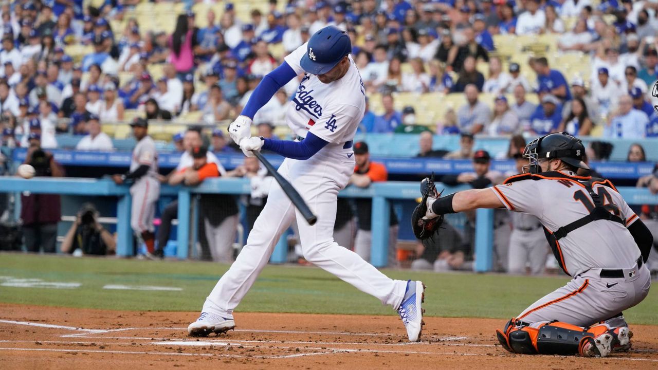 L.A. Dodgers' Freddie Freeman High Fives Dad After First Home Run