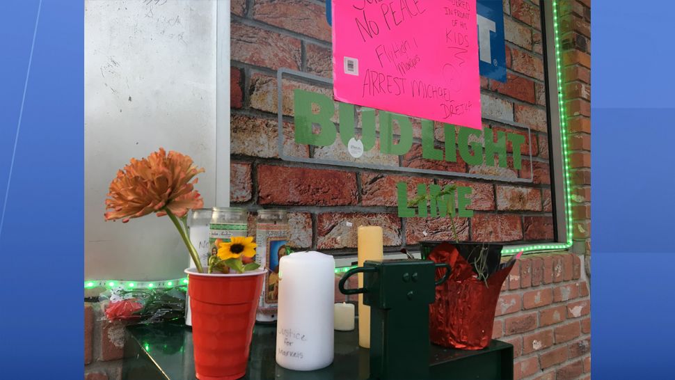 Community members created a memorial outside the Circle A Food Store in Clearwater in honor of Markeis McGlockton who was shot and killed there on Thursday, July 19. 