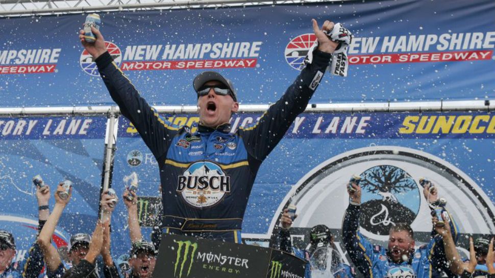 Kevin Harvick celebrates in Victory Lane after winning a NASCAR Cup Series auto race Sunday, July 22, 2018, at New Hampshire Motor Speedway in Loudon, N.H. (AP Photo, Mary Schwalm)
