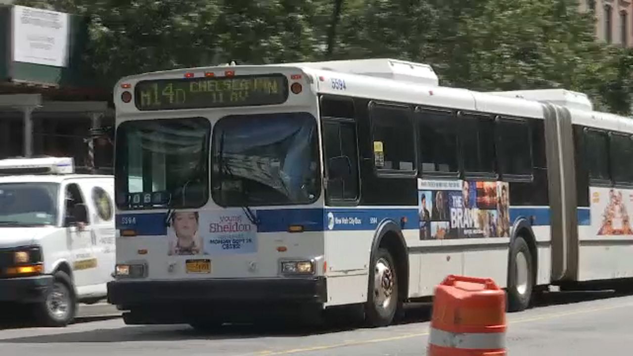 A bus on a city street.