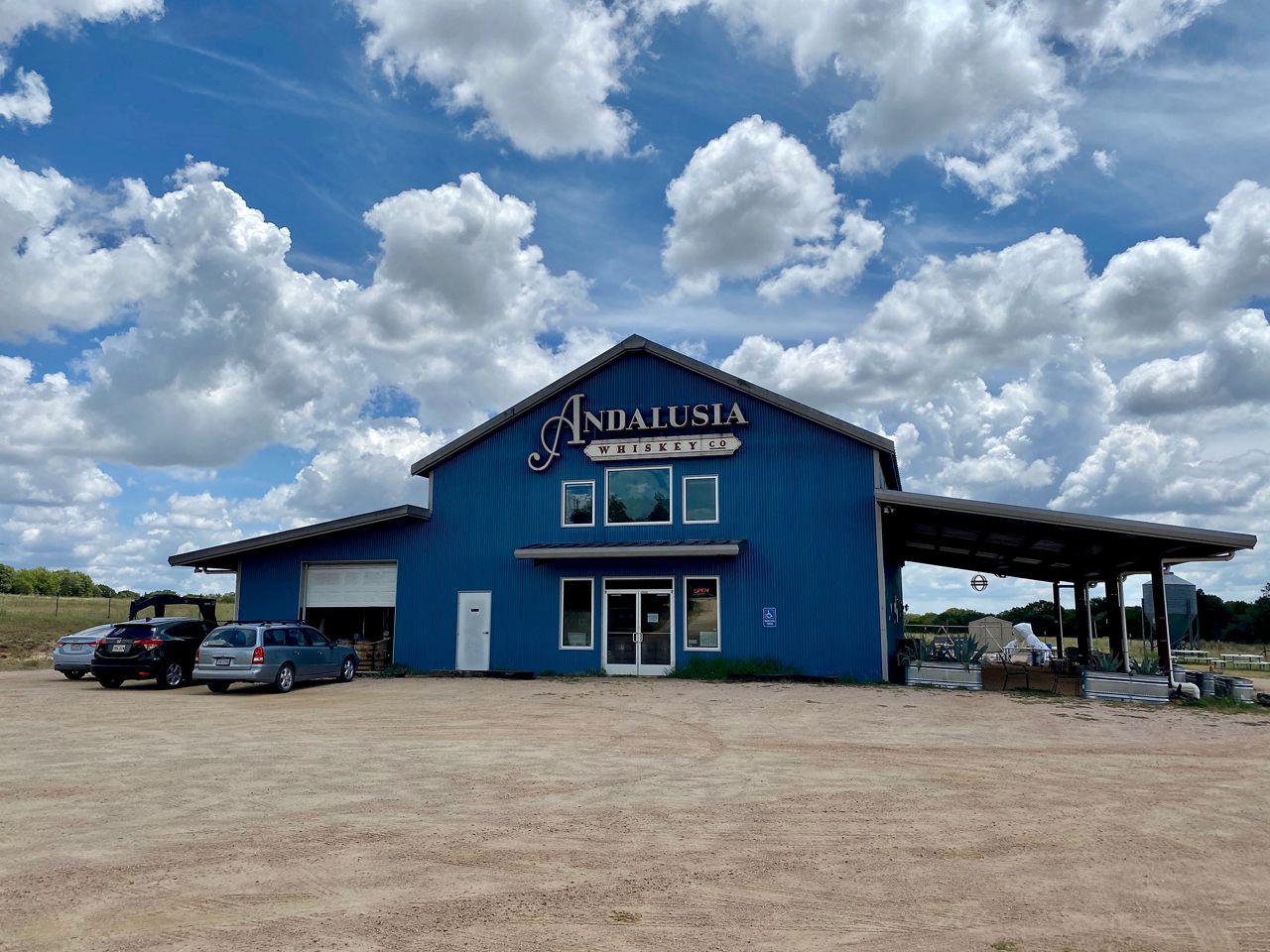 Customers can only buy at most two bottles a month from Andalusia Whiskey’s tasting room. Distillery owners are seeking to change that. (Reena Diamante/Spectrum News)