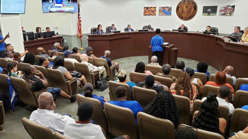 An attendee at a Manatee School Board meeting addresses the members regarding the issue of Lincoln Memorial Academy, Tuesday, July 23, 2019. The board voted during that meeting to retake control of the school. (Angie Angers/Spectrum Bay News 9)