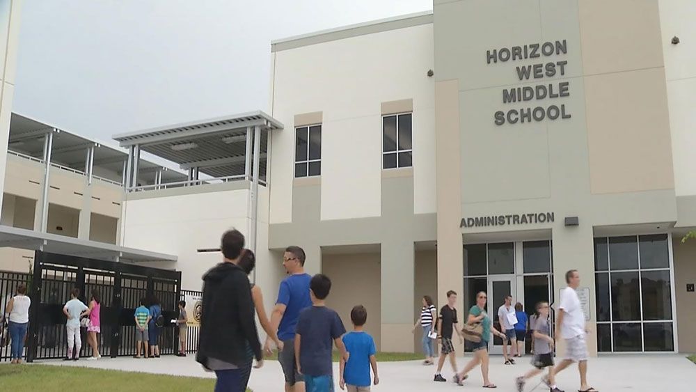 Parents and students check out the new Horizon West Middle School in Orange County Tuesday. (Spectrum News)