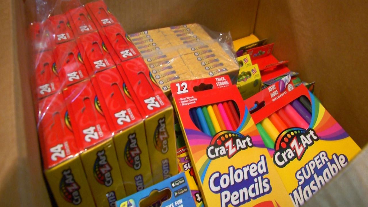 The organization has also been providing school supplies and clothing to students going back to school in person. (File photo)