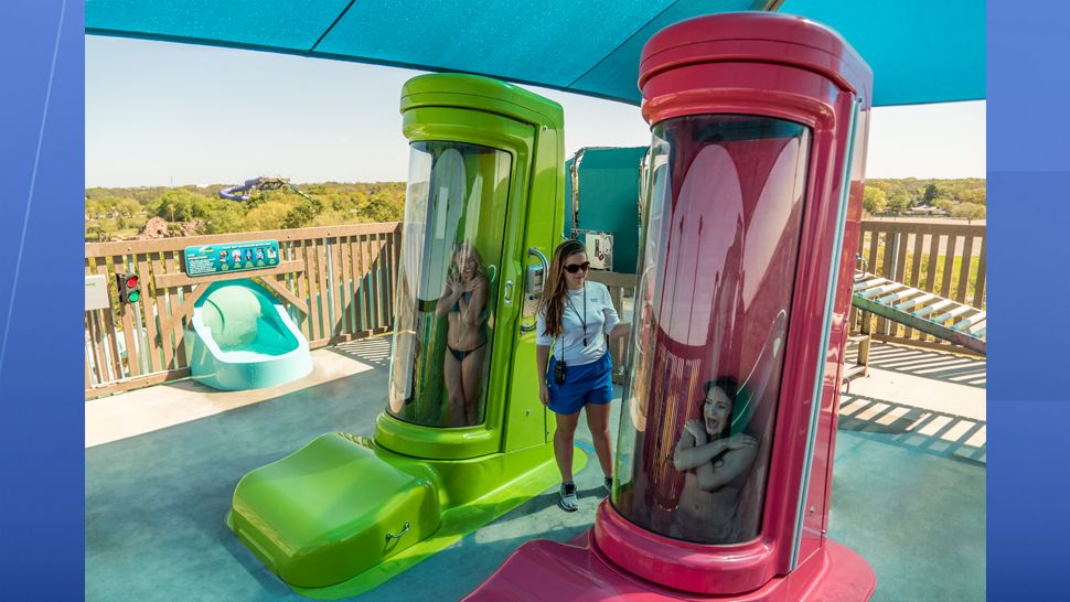 Adventure Island's newest slide, Vanish Point, is a 70-foot drop slide. Riders choose between two wave paths, one that drops the floor from beneath their feet or one that begins in a seated position before taking a steep dive on a 455-foot-long speed slide. (Adventure Island)