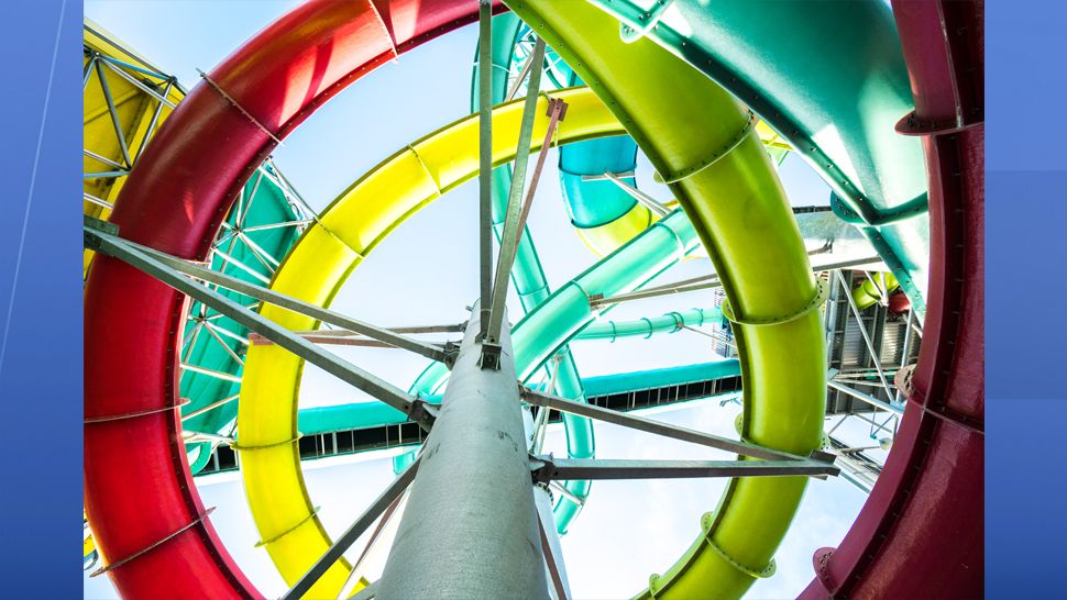 Adventure Island's newest slide, Vanish Point, is a 70-foot drop slide. Riders choose between two wave paths, one that drops the floor from beneath their feet or one that begins in a seated position before taking a steep dive on a 455-foot-long speed slide. (Adventure Island)