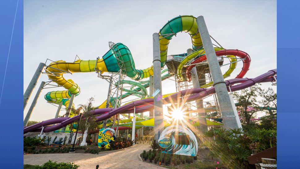 Adventure Island's newest slide, Vanish Point, is a 70-foot drop slide. Riders choose between two wave paths, one that drops the floor from beneath their feet or one that begins in a seated position before taking a steep dive on a 455-foot-long speed slide. (Adventure Island)