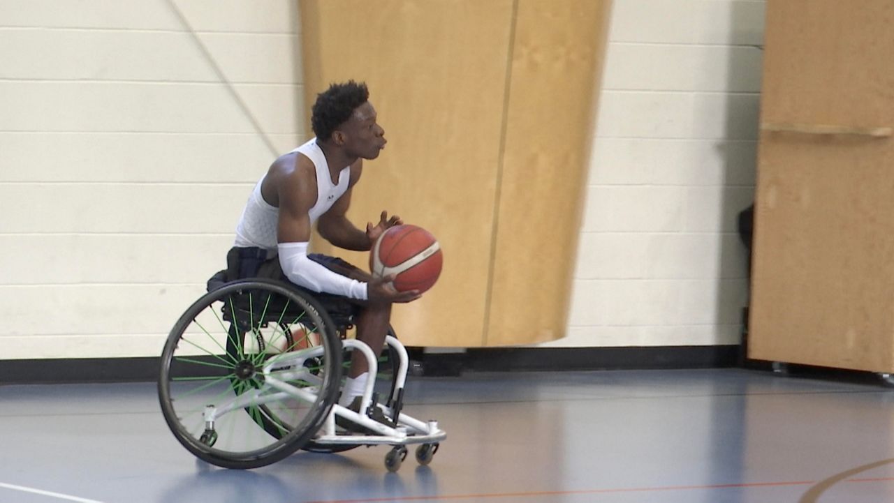 Wheelchair basketball coach reflects on long journey
